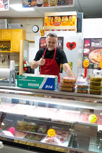 Albanian butcher — fresh halal meat counter
